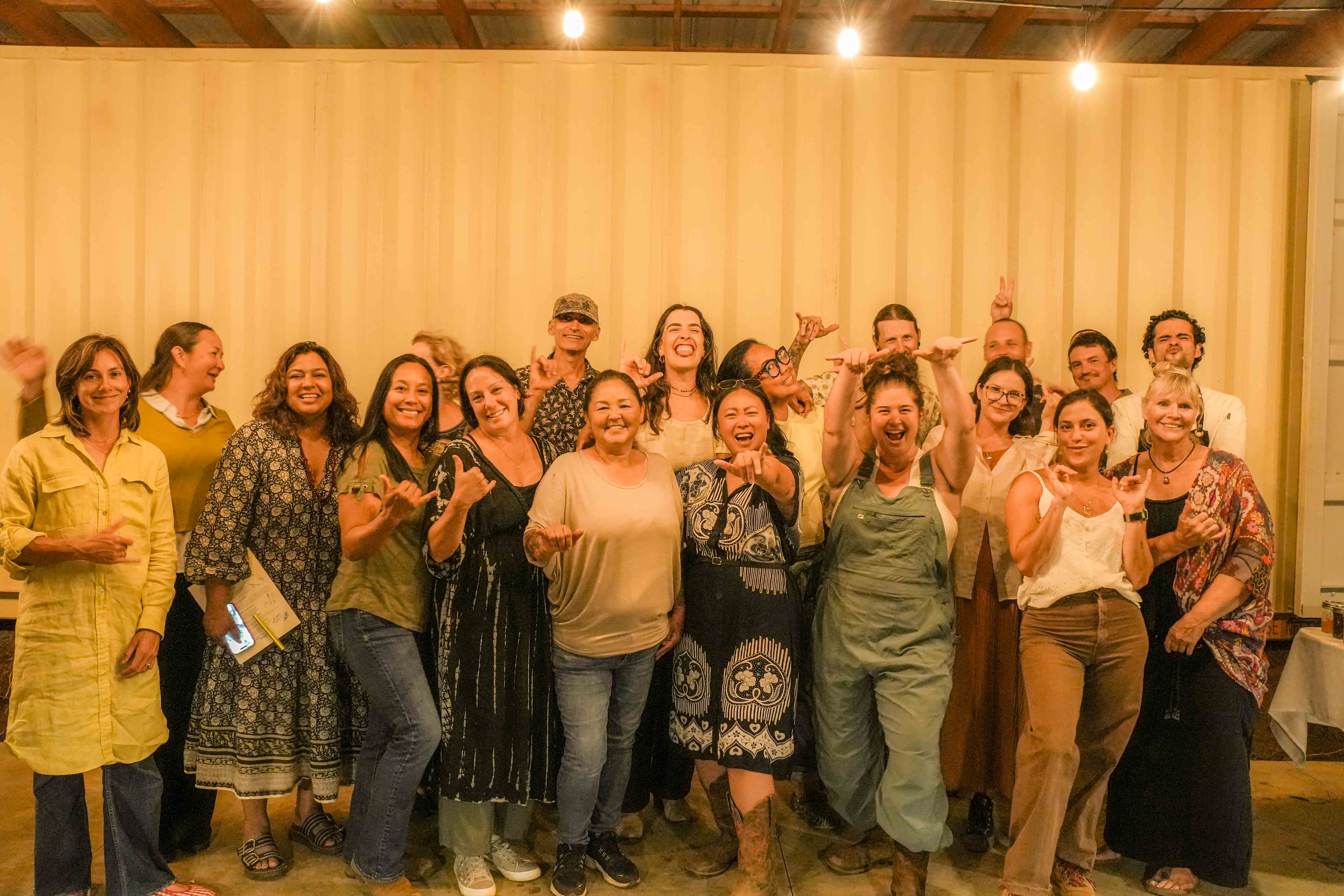 A class group celebrating with Chef Agustin after the meal